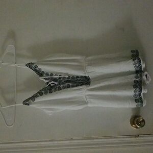 White romper with cute details